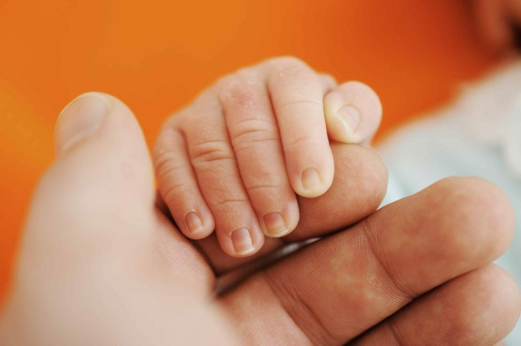 Baby Holding Parents Hand